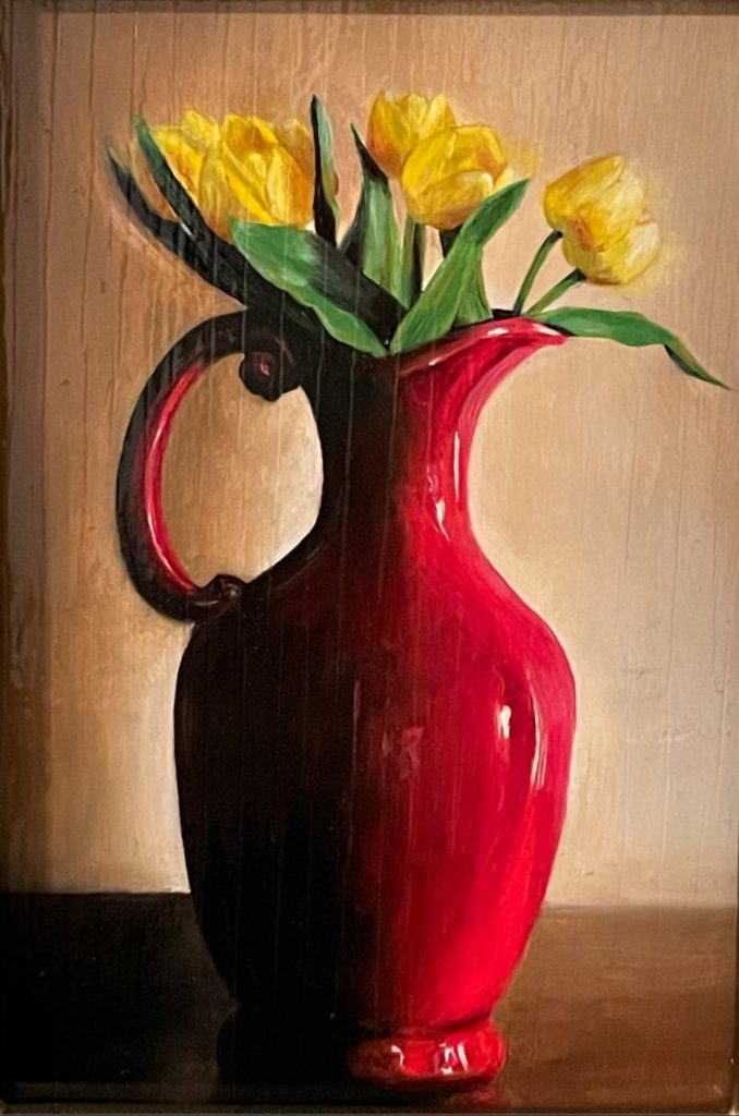 Oil painting of a red ceramic pitcher holding yellow tulips against a warm beige wall.