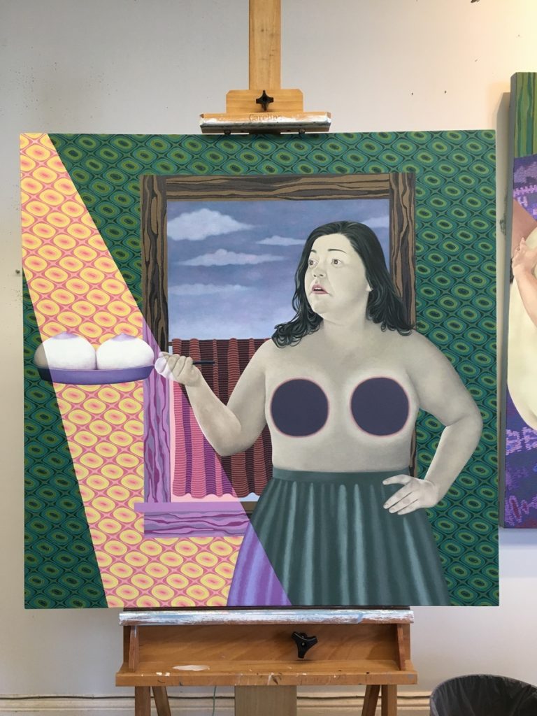 Oil painting of a woman with abstract circular forms on her torso standing before a patterned wall and curtained window.