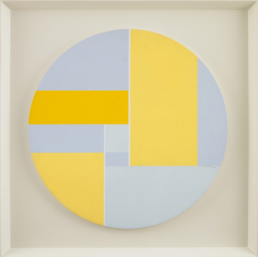 Circular acrylic painting on wood divided into interlocking rectangular fields of yellow and grey-blue.