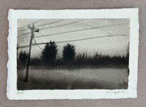 Ink wash landscape of a utility pole with power lines above a dark treeline and misty field.