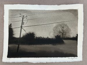 Ink wash of a rural landscape with a utility pole, power lines, dark hedgerow, and bare tree under a gray sky.