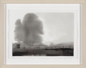 Ink and salt wash landscape of a large billowing tree form above a dark, misty field with a fence line.
