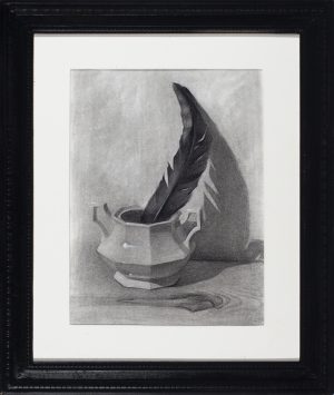 Charcoal drawing of a dark quill feather standing in a small octagonal ceramic inkwell on a wooden surface.